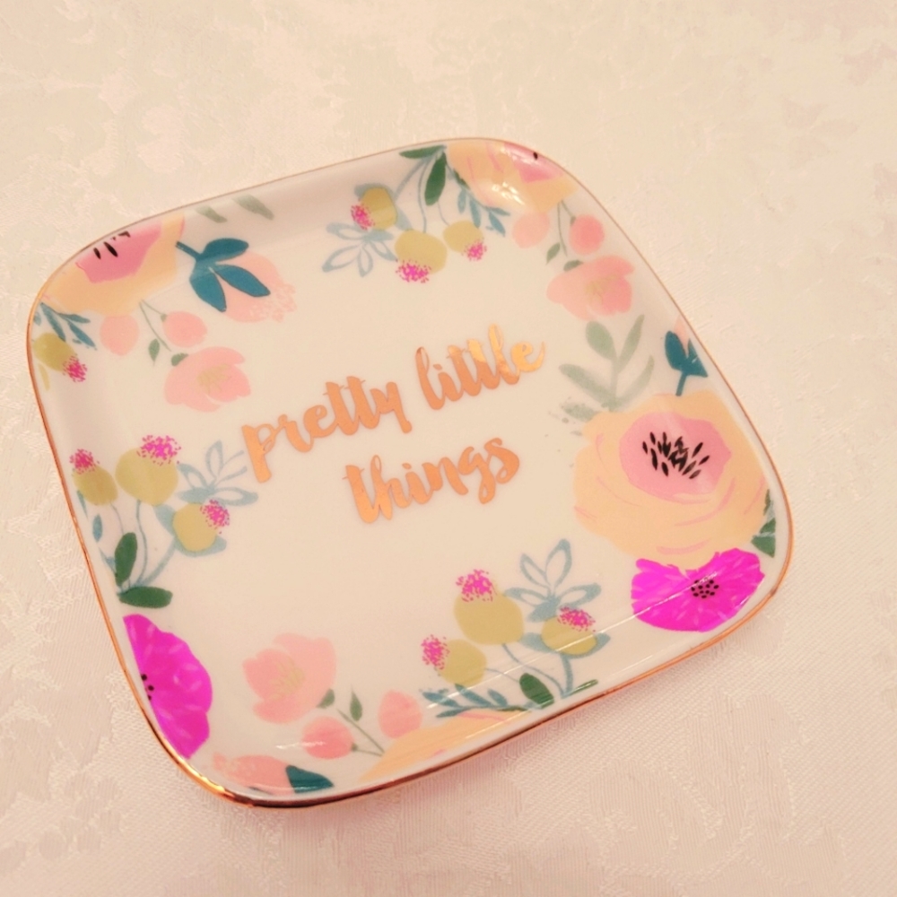 Jewelry dish with floral pattern and gold trim